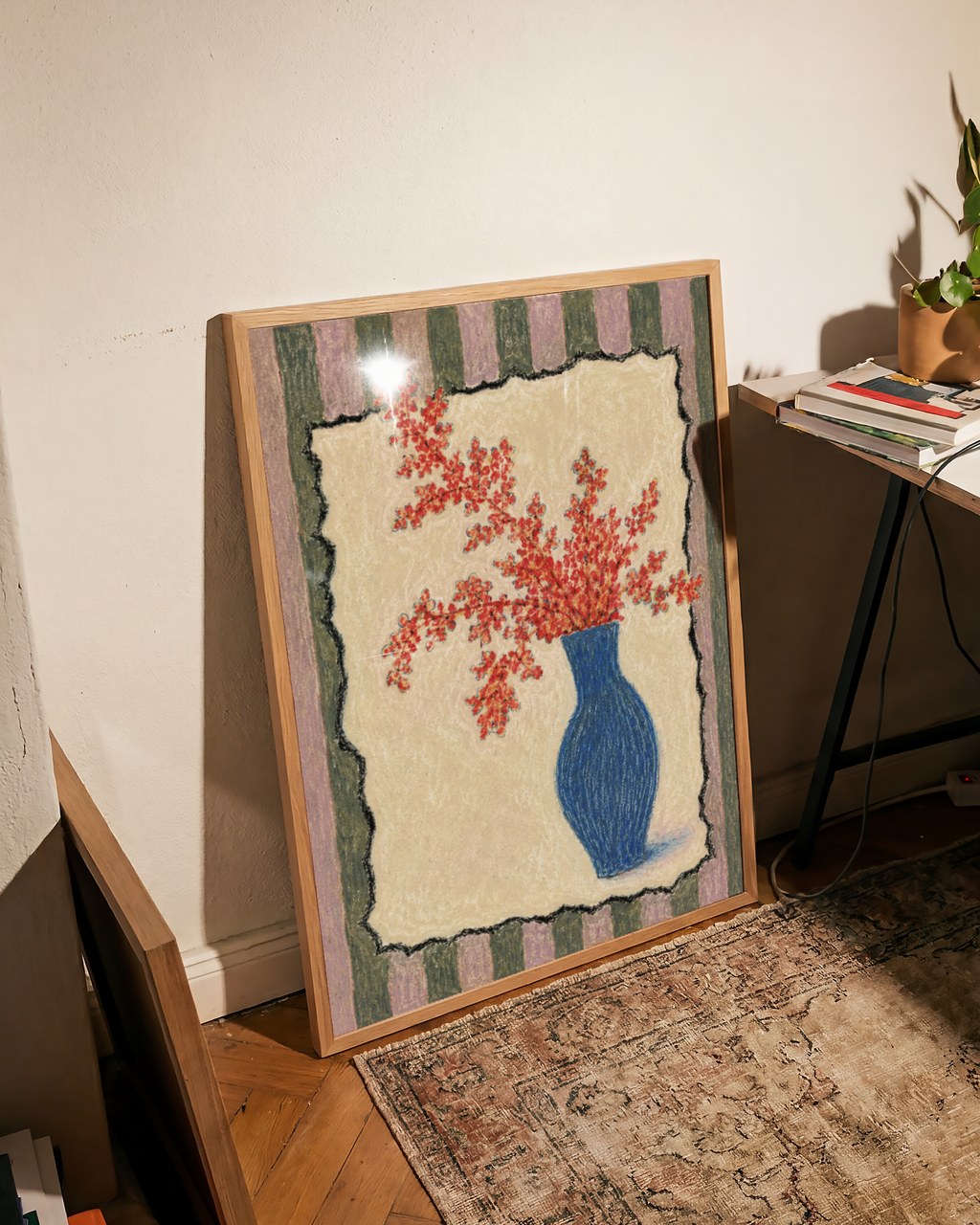 Red Flowers in a Blue Vase