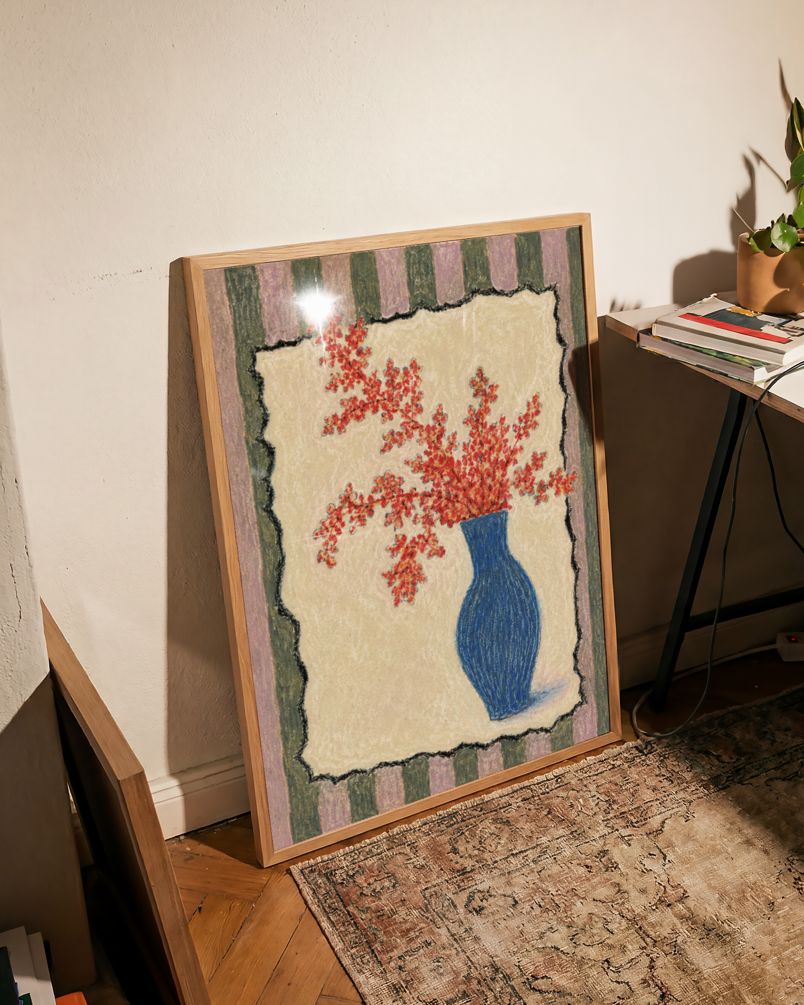 Red Flowers in a Blue Vase